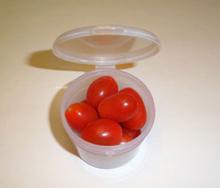 Vial with tomatoes