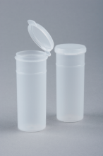 Two vials one with lid open