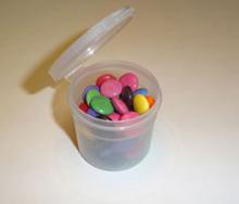 Vial with lid open with smarties